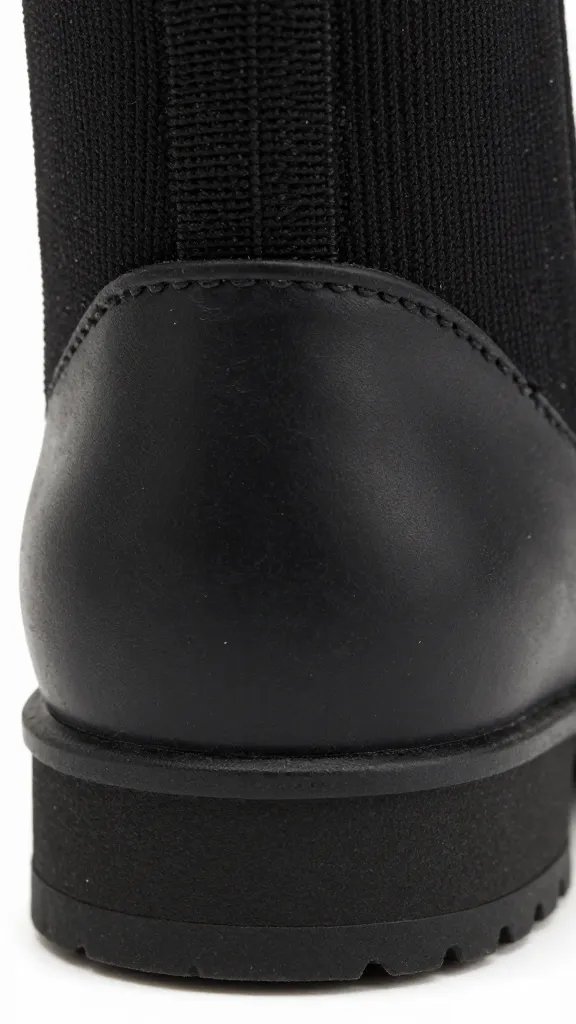 cushioned boot heel cap closeup with minimal wear marks