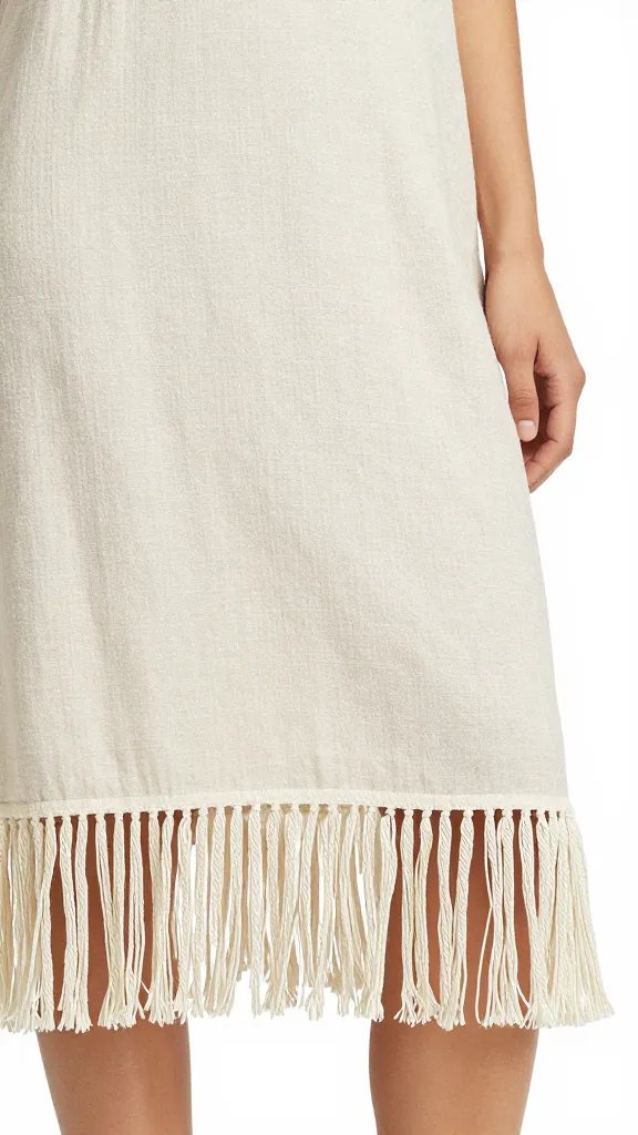 linen midi dress with tonal fringe hem, hemline closeup